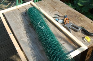 Save Our Earth Blog - Now time to staple the mesh to the frame